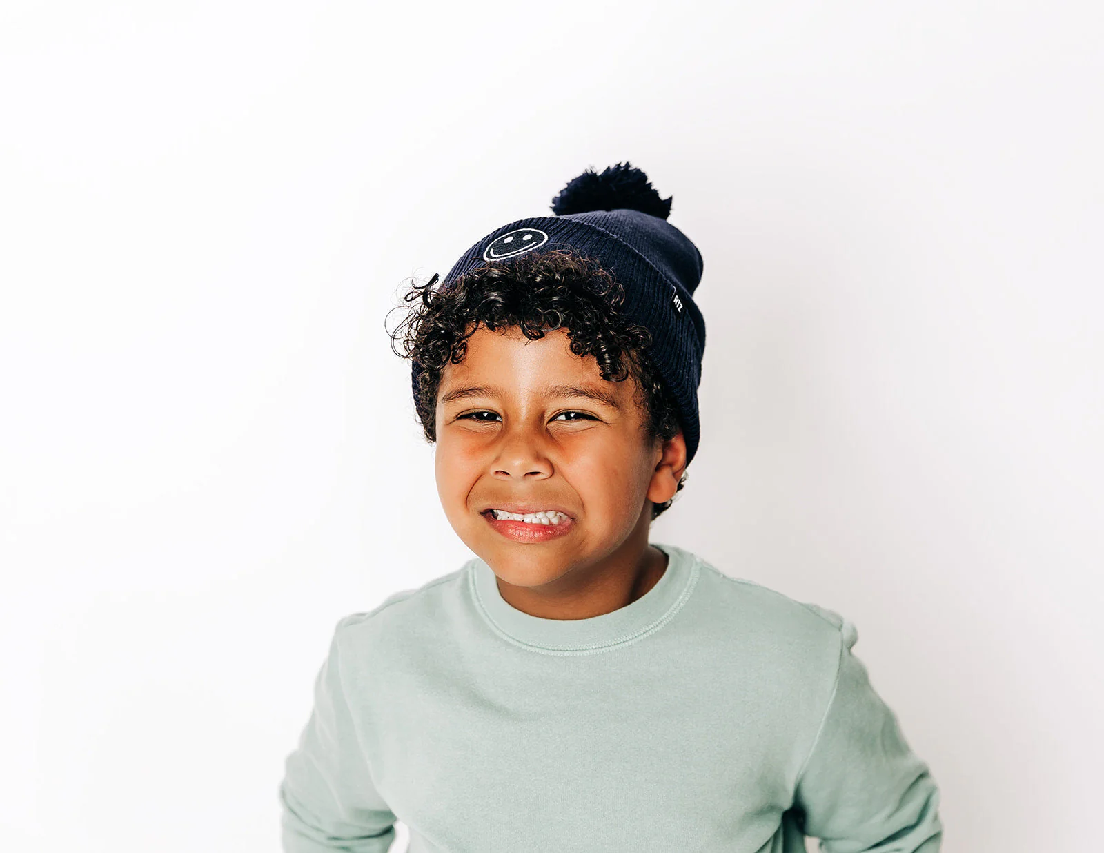 Smiley Pom Pom Beanie Hat - Image 31
