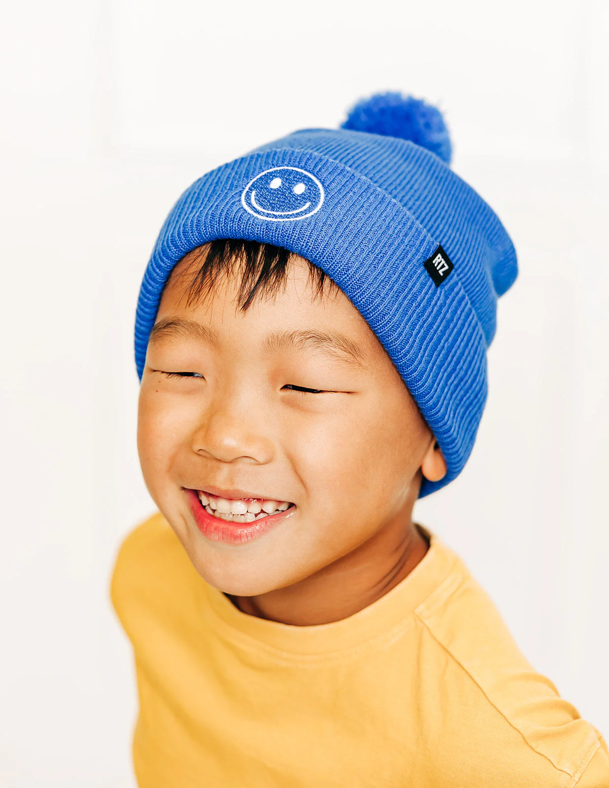 Smiley Pom Pom Beanie Hat - Image 34